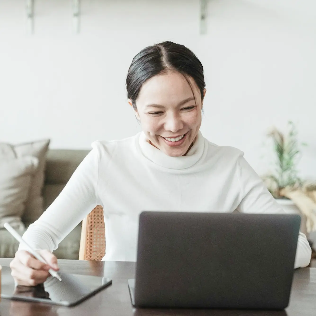 a woman does an virtual meeting on the computer