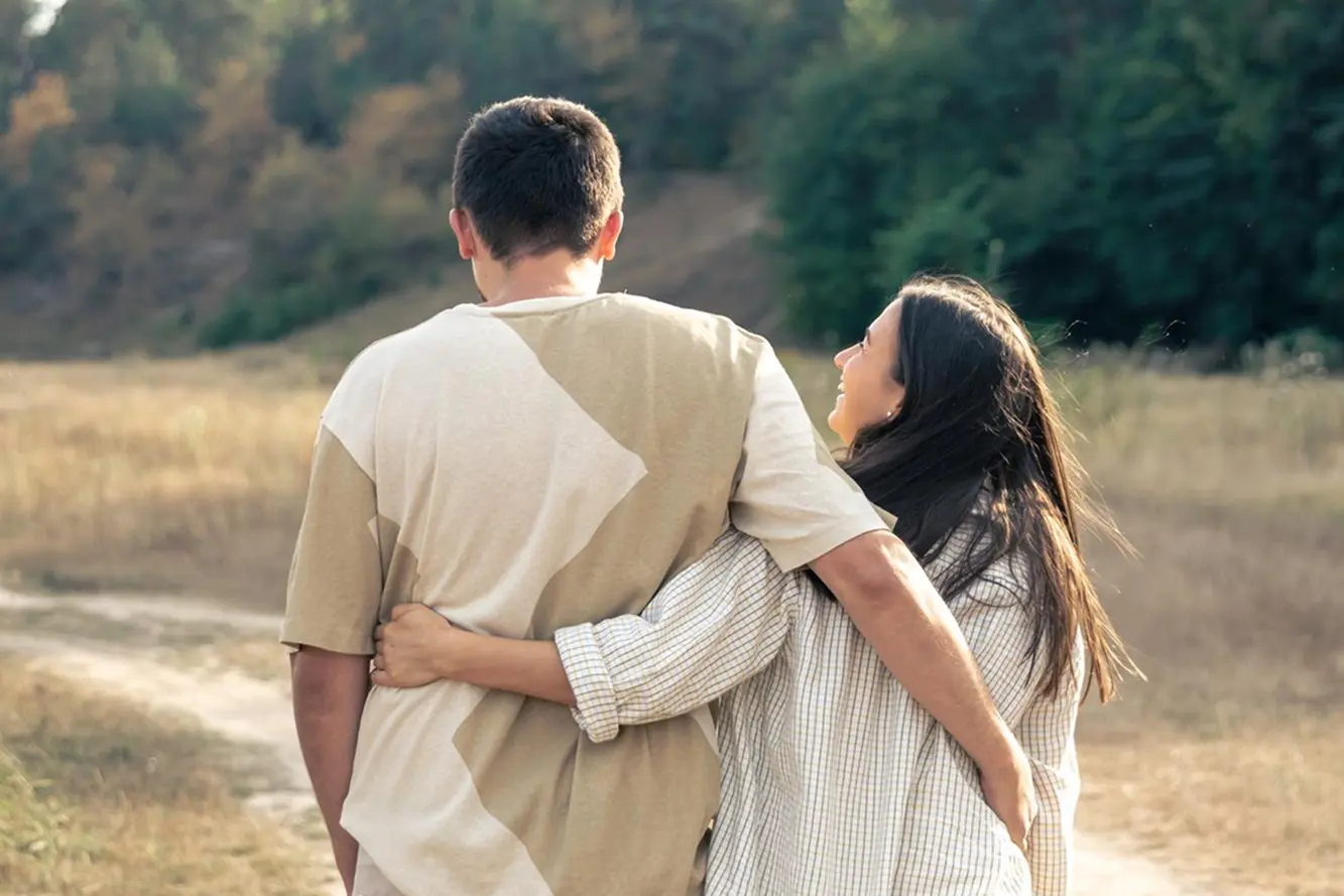 a couple hold each other