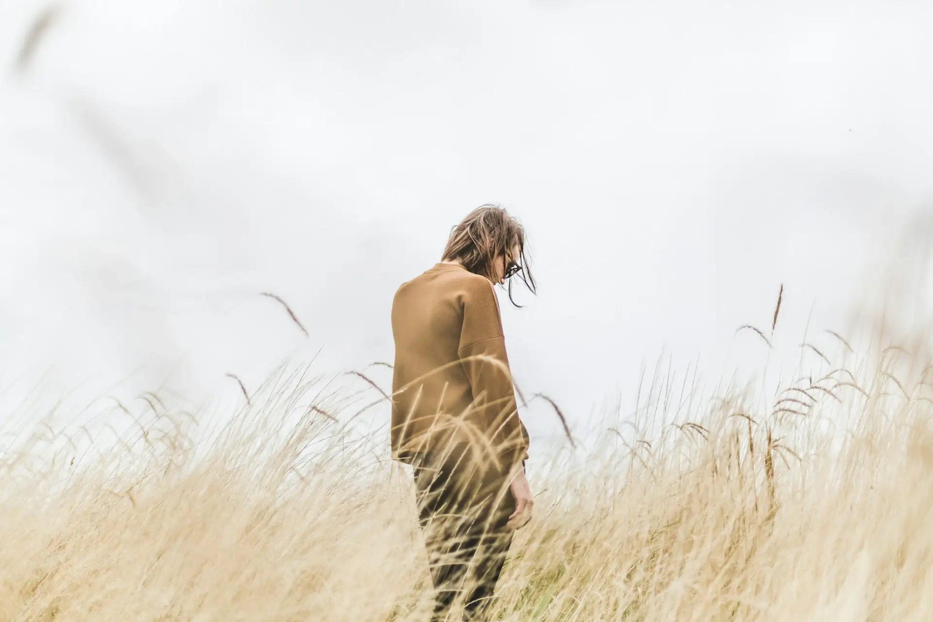 a man stands in the reed bush